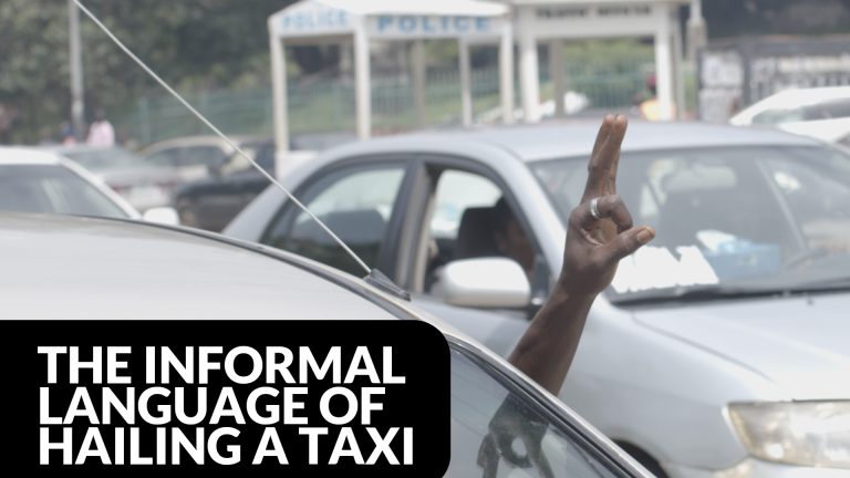 Hand signals for hailing taxis in Abuja, Nigeria